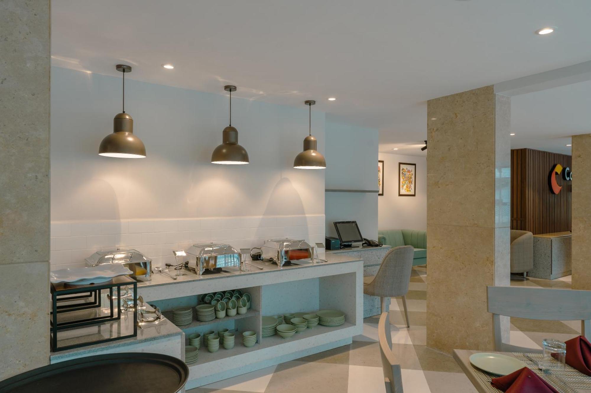 Comfort Inn Elite Jua Bagian luar foto