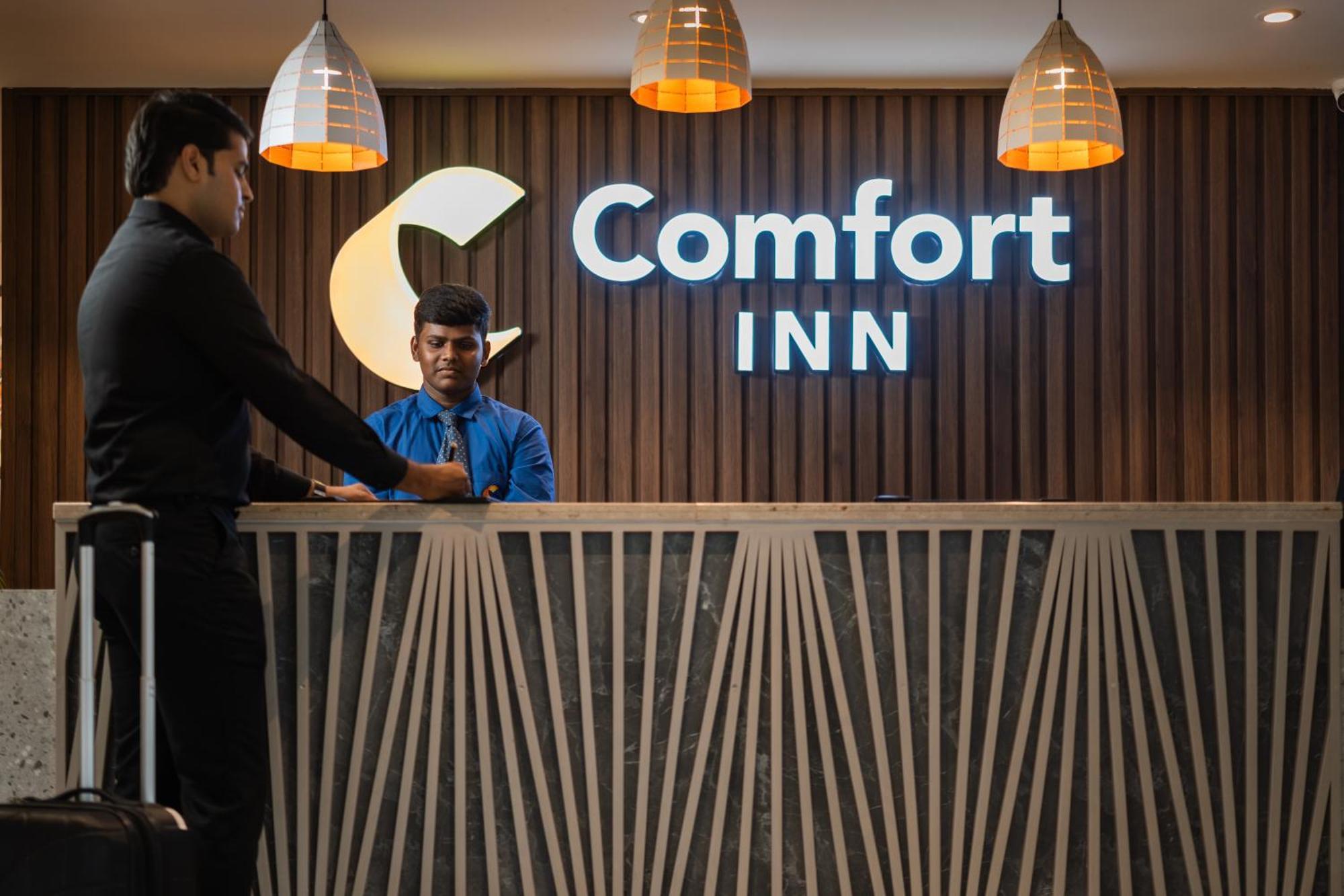 Comfort Inn Elite Jua Bagian luar foto